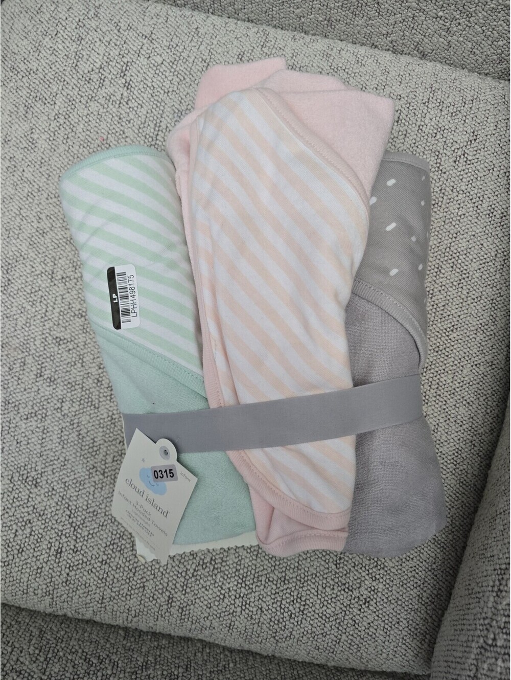 Hood and towels brand new three pack item, 315 bin 13